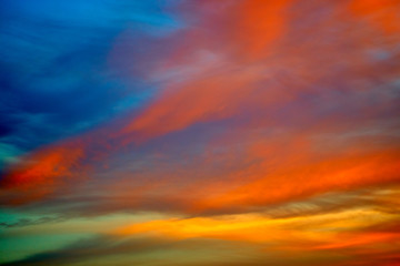 Incredibly colorful sunset on the tropical beach. Abstract natural background.