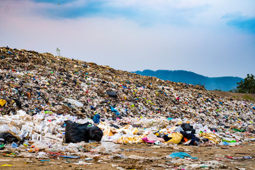 Mountain large garbage pile and pollution,Pile of stink and toxic residue,These garbage come from...