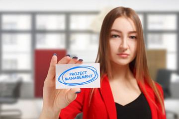 Business, technology, internet and networking concept. Young entrepreneur showing keyword: Project...