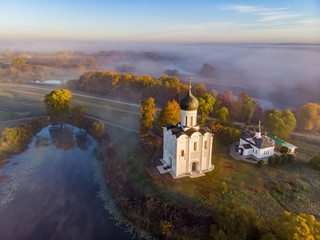 Church of the Intercession of the Holy Virgin on the Nerl River in autumn morning, Russia. Top view