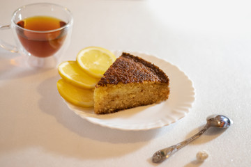 homemade lemon pie on white background flavored tea