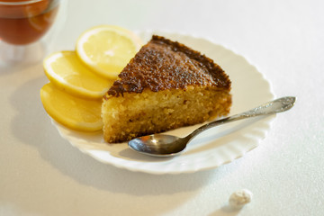 homemade lemon pie on white background flavored tea