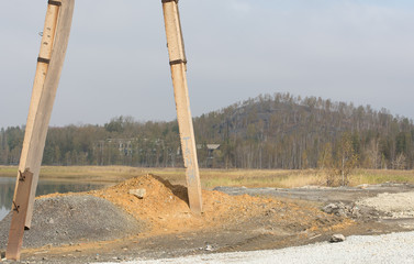 High voltage steel electrical pole outdoors in mountain.