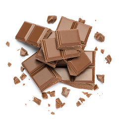 Milk organic chocolate pieces isolated on white background