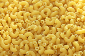 Raw wheat pasta close up