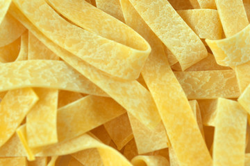 Raw wheat pasta close up