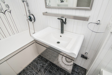 The photo of a sink in a bathroom