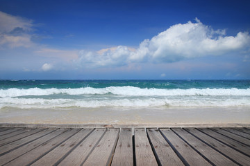 Fototapeta premium Relax time wooden floor and beautiful sea background in Thailand
