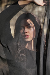 Beautiful girl in black till