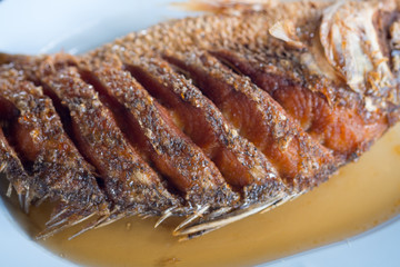 Fried snapper topped with fish sauce