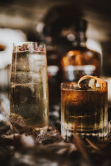 A close up shot of whisky cocktails with ice cubes. Concept of fine alcohol, beverage and cocktails.