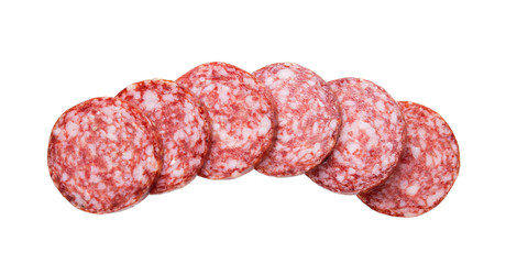 Top view of sliced sausage salami isolated on white background.