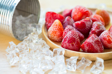 Strawberry frozen with ice. close-up