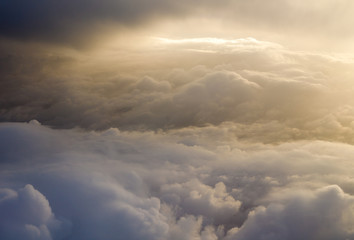 thunder storm from above with a blanket of clouds