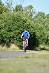 Athlete Male Cyclist And Exercise Cycling