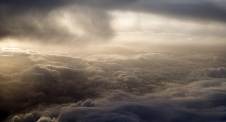 thunder storm from above with a blanket of clouds
