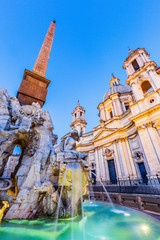 Rome, Italy. The fountain of the four Rivers with Egyptian obelisk at twilight, Piazza Navona.