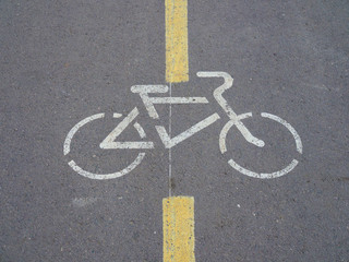 Obraz premium sign Bicycle paths on the gray asphalt on a city street