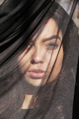 Beautiful girl in black till