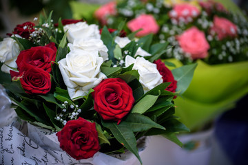Bouquet of beautiful pink roses red white together flower.