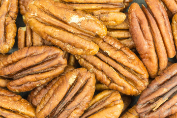 background of pecan nuts - carya illinoinensis