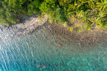 Aerial view above Beautiful views of the sea on the island and tourists kayaks.