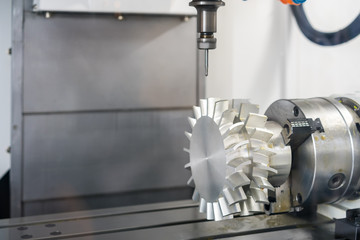 Close up cutting tool working with workpiece (propeller)  by high speed and  accuracy cnc machining center