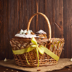 Congratulatory Easter cake in the basket, Traditional Kulich, Paska  ready for celebration