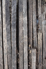 Wooden natural brown background with scars and patterns. Wooden slats. Burned Tree