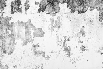 Wall fragment with scratches and cracks. Old concrete wall texture grunge background. Vintage or grungy white background of natural cement or stone old texture as a retro pattern wall.