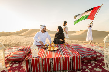 Arabian family in the desert
