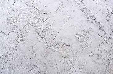 Background and texture of decorative plaster to cover the walls and ceilings. Background for design and decoration.