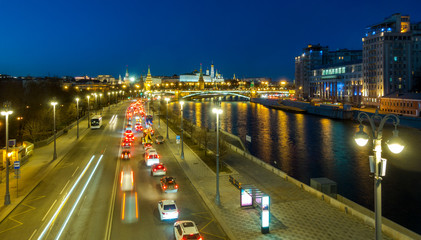 Fototapeta na wymiar Car traffic on Prechistenskaya embankment, Moscow, Russia