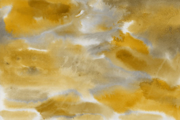 Yellow spring watercolor texture with abstract washes and brush strokes on the white paper background. Chaotic abstract organic design.