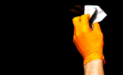 Car polish wax worker hands polishing car. Buffing and polishing vehicle with ceramic. Car...