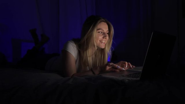 girl talking through a laptop