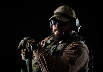Naklejka premium Armed soldier ready for battle. Military concept.