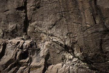 Background of stone wall texture rough rock surface