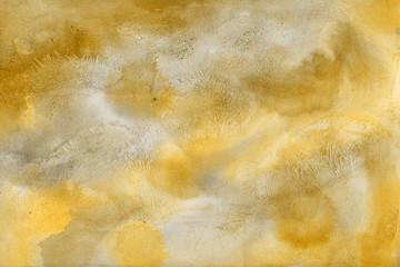 Yellow spring watercolor texture with abstract washes and brush strokes on the white paper background. Chaotic abstract organic design.