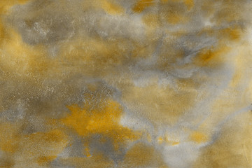 Yellow summer watercolor abstract background with waves and strokes on white paper background. Trendy look. Chaotic abstract bright design.