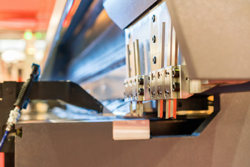 Close up teeth of semi automatic metal sheet bending machine for industrial