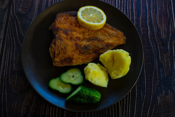 Fried flounder. Home cooking in a rustic style.