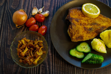 Fried flounder. Home cooking in a rustic style.