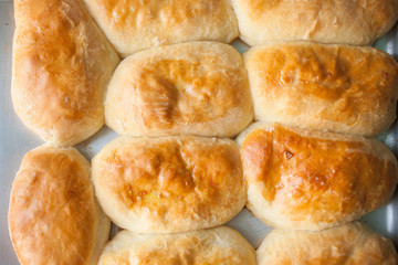 Baking tray with cakes. Top view