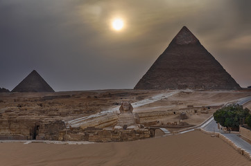 Fototapeta na wymiar The Pyramids and the Sphinx of Giza in the twilight, Egypt