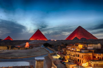 The Pyramids at night, view from Giza buildings, Egypt