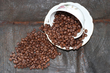Coffee beans and scattered on the background. - Image