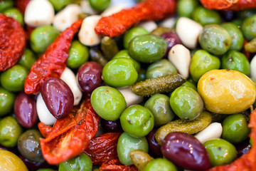 Olives, Cornichons, Garlic, Chilli and Roasted Peppers Antipasti mixed with Olive oil