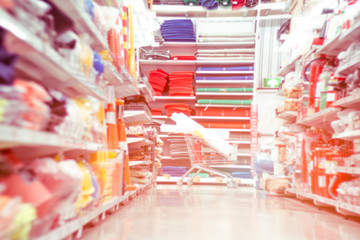 Blurred image of shop building materials. The interior of the retail store for residential improvement is the background.