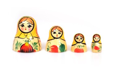 Traditional Russian wooden toy "Matryoshka" isolated on white background